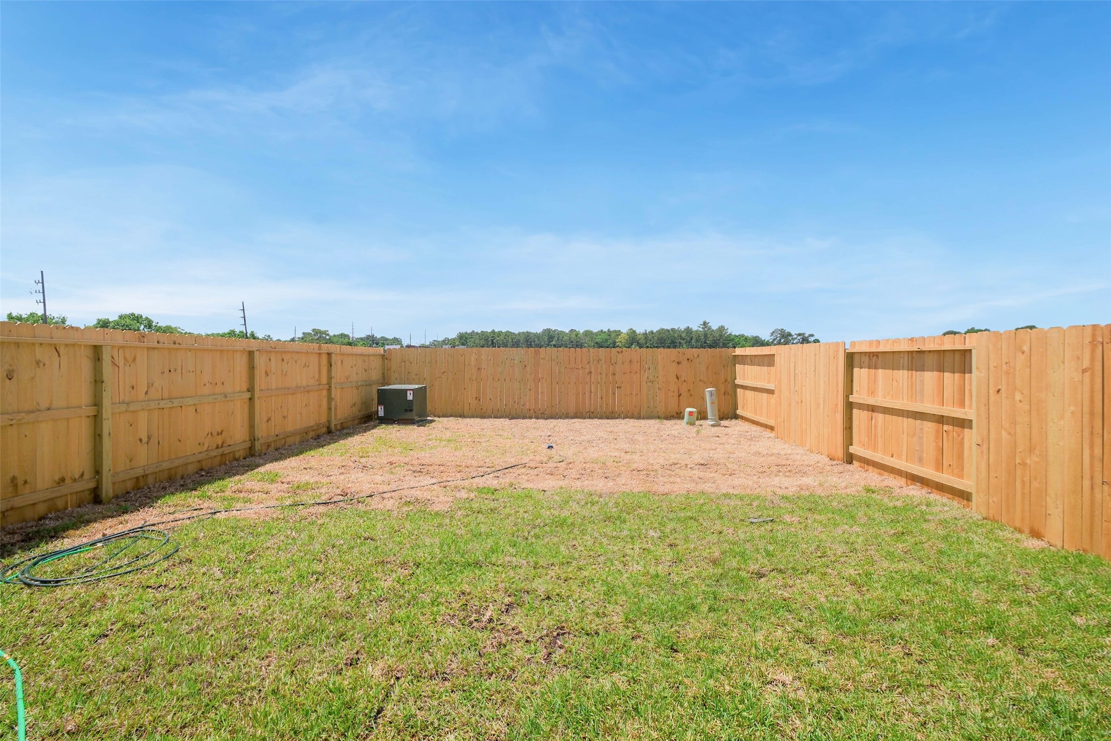 703 Majestic Eagle Court Houston, TX 77090 - Photo 37 of 40 a view of a backyard