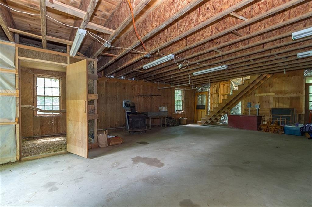 1396 West Appleton Road Appleton, ME 04862 - Photo 24 of 35 Clear span inside barn allows for...