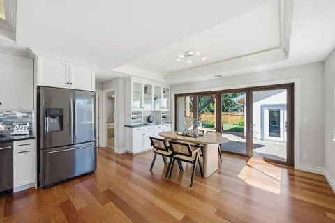 a bathroom with a double vanity sink mirror and double