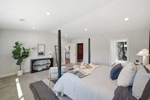 a kitchen with a sink a stove and cabinets