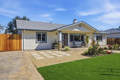 a front view of a house with a porch
