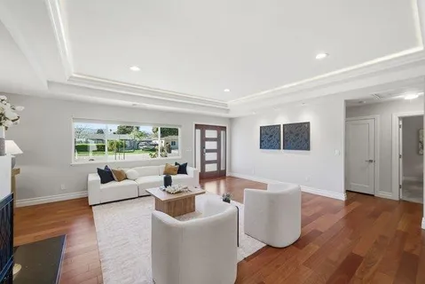 a kitchen with stainless steel appliances kitchen island granite countertop a stove and refrigerator
