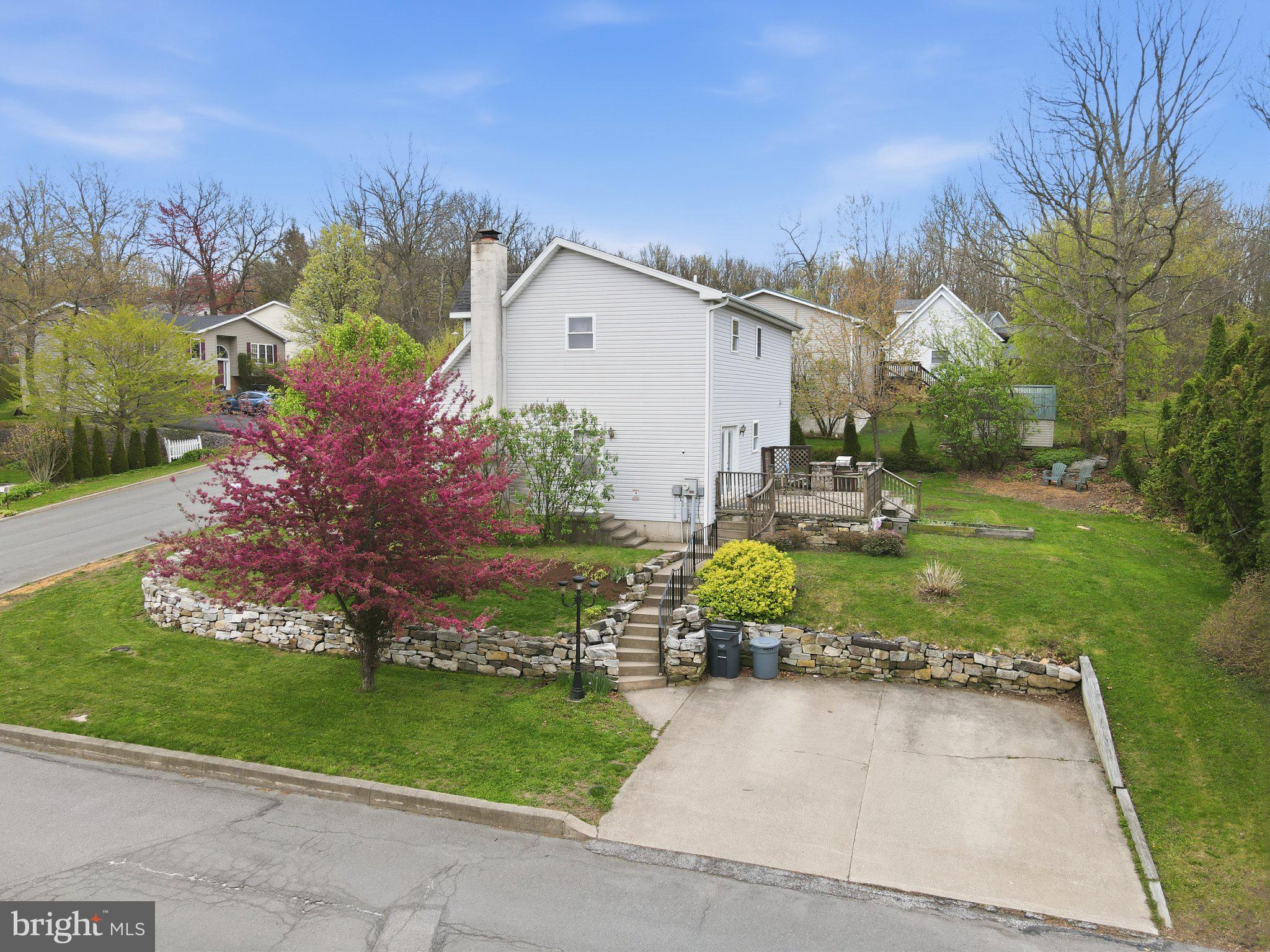 30 Freedom Street Hazleton, PA 18202 - Photo 76 of 84 Charming home with vibrant landscaping.
