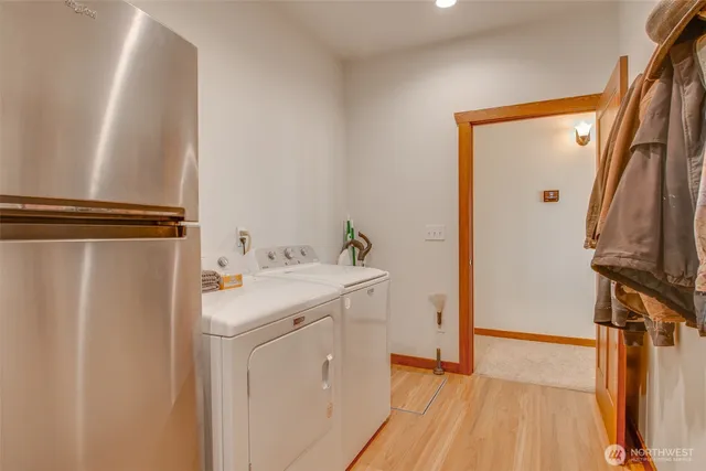 a utility room with dryer and washer