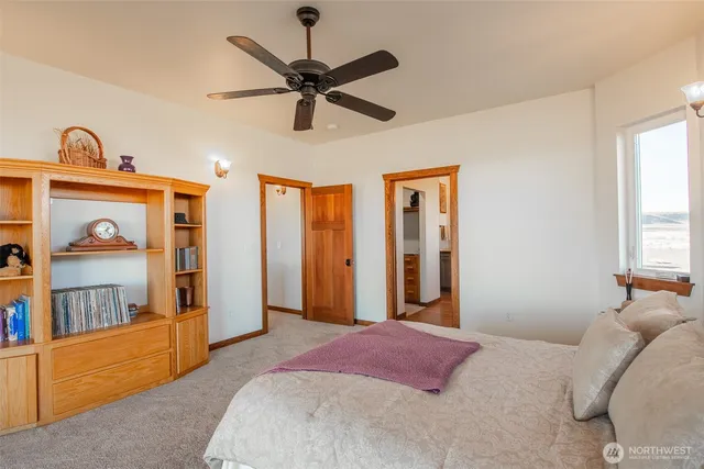 a bathroom with a granite countertop sink mirror and double