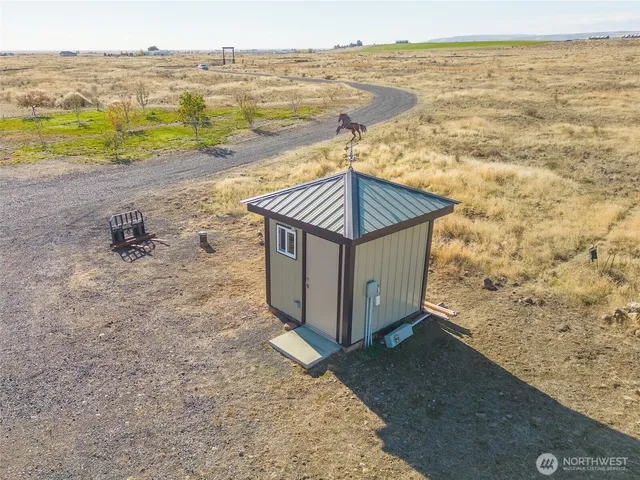 a bird view of house and outdoor space