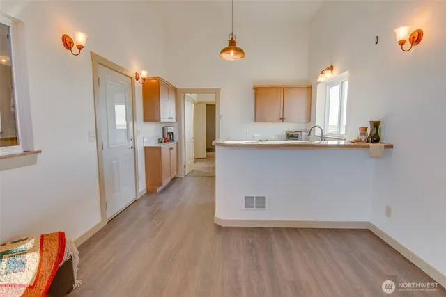 a bathroom with a sink a vanity and a mirror