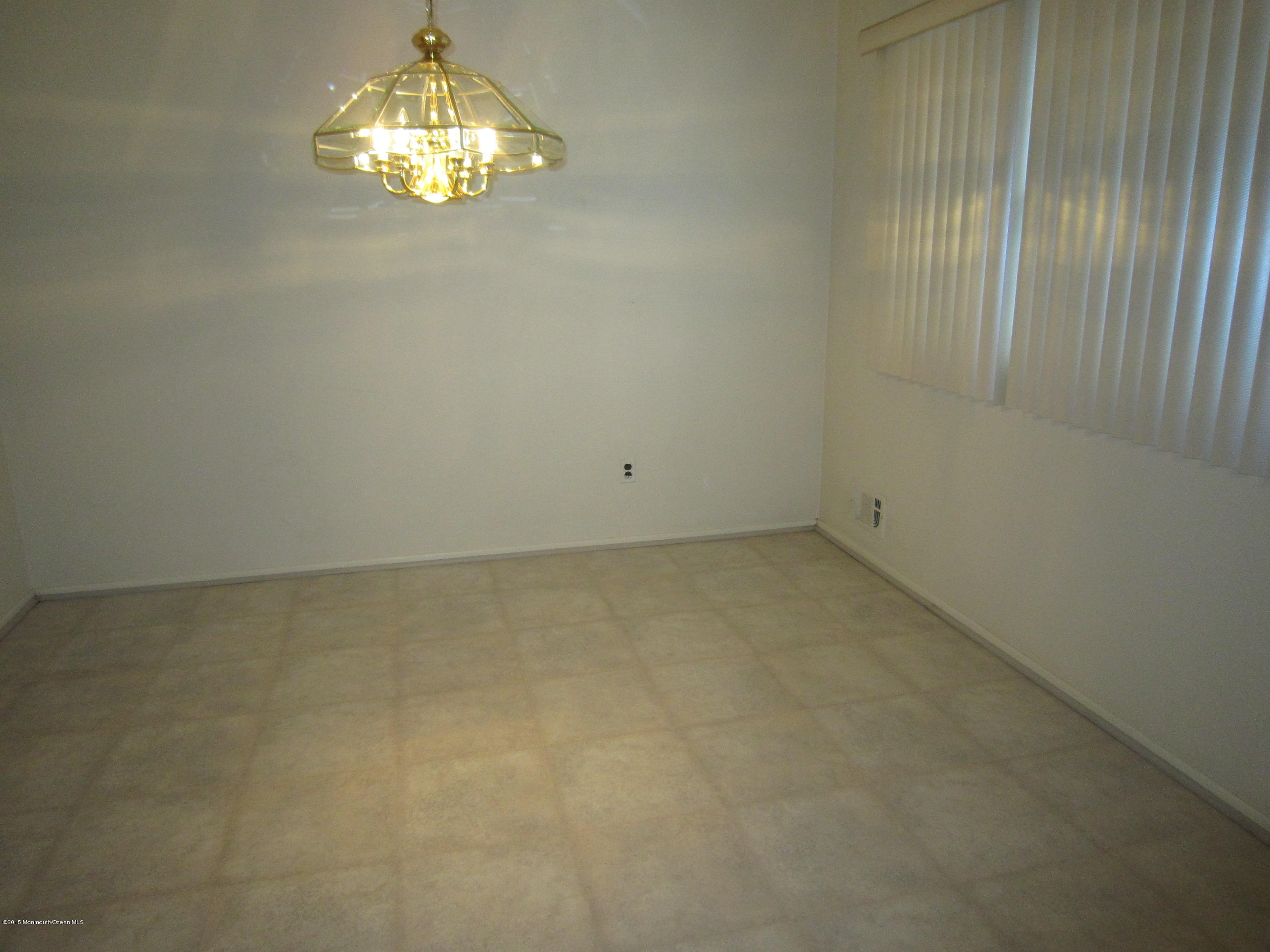 12 Pittsfield Road Howell, NJ 07731 - Photo 2 of 6 Formal Dining room with laminate floor