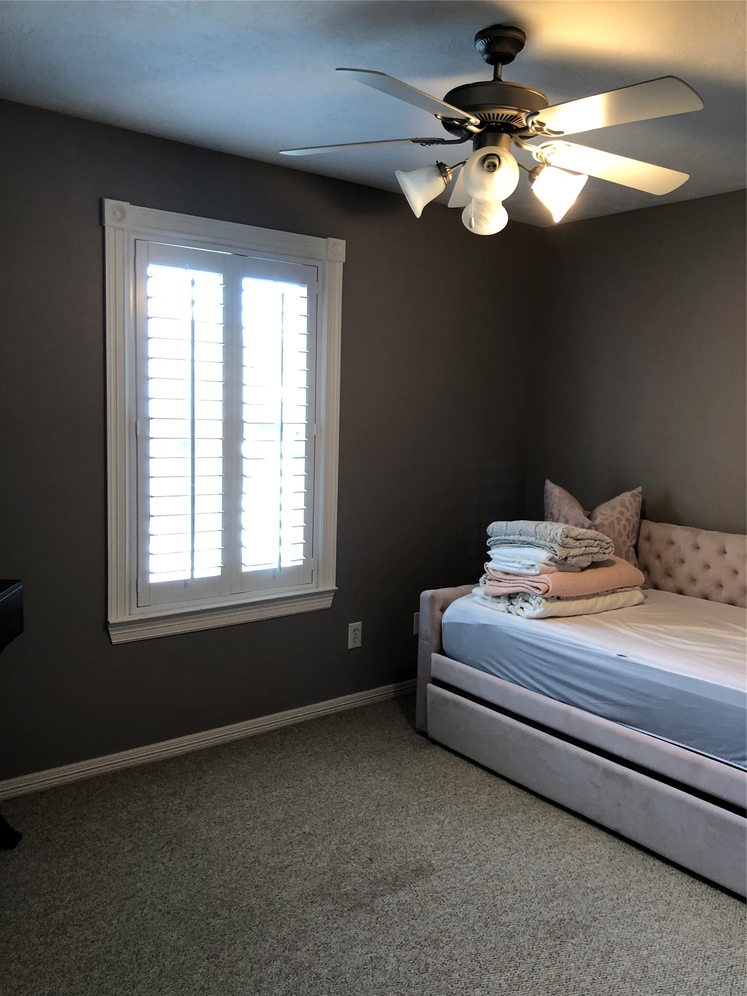 951 Lamonte Lane Houston, TX 77018 - Photo 14 of 26 a bedroom with a bed and a chandelier