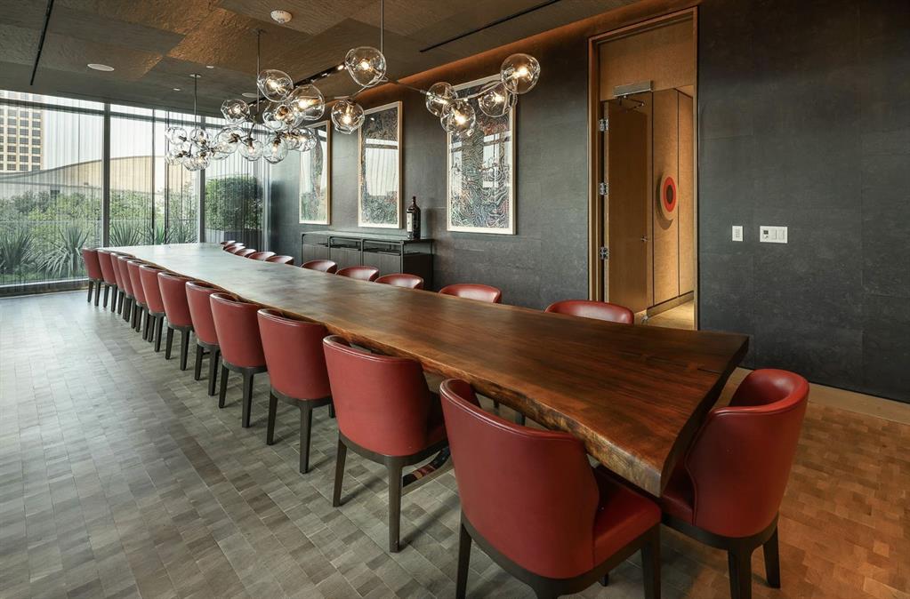 1747 Leonard Street, Unit 1402 Dallas, TX 75201 - Photo 32 of 36 a room with chairs a table and chairs