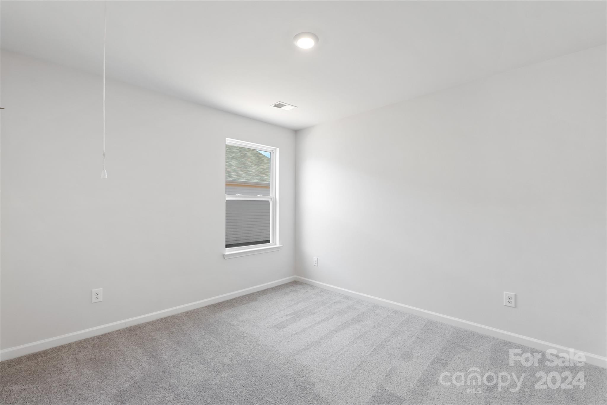 160 Callie River Clyde, NC 28721 - Photo 11 of 24 an empty room with a window