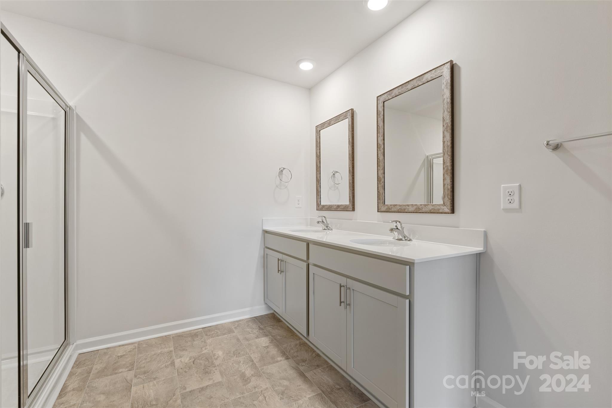 160 Callie River Clyde, NC 28721 - Photo 15 of 24 a bathroom with 2 sink and a mirror