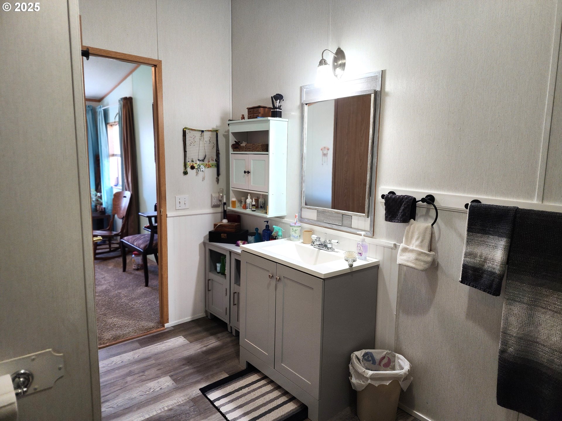 313 12th Street, Unit 4 La Grande, OR 97850 - Photo 21 of 32 a view of bathroom with sink and mirror