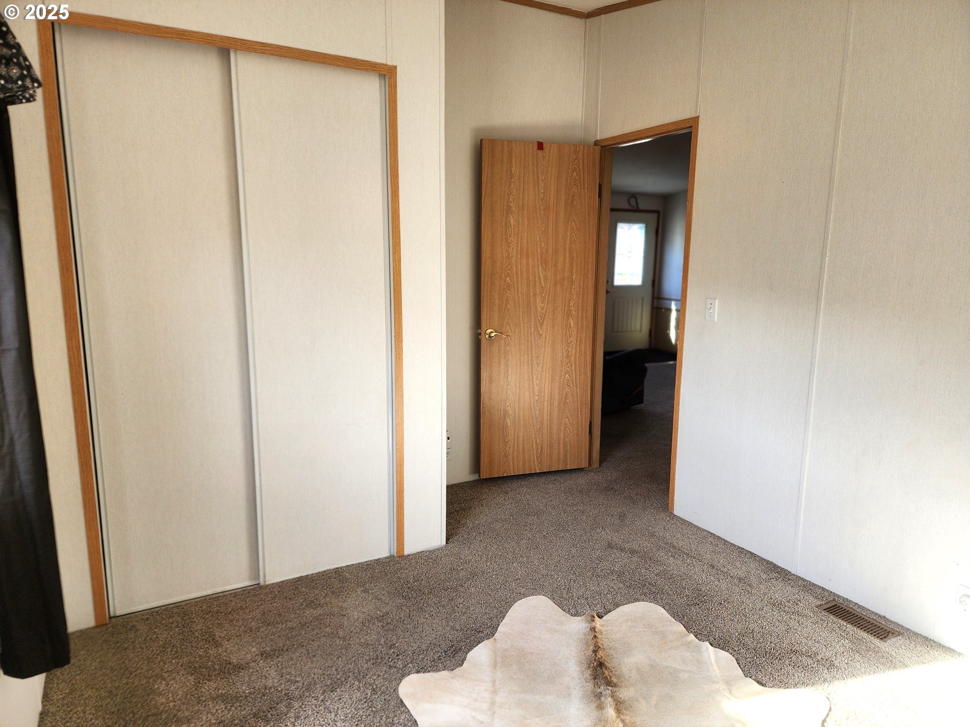 313 12th Street, Unit 4 La Grande, OR 97850 - Photo 30 of 32 a view of livingroom with furniture and closet