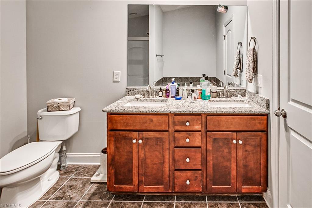 688 Nikyle Circle High Point, NC 27265 - Photo 22 of 38 Owner's Bath - Granite Countertop, Ceramic Tile Floor