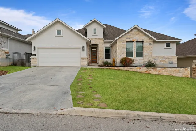 front view of a house and a yard