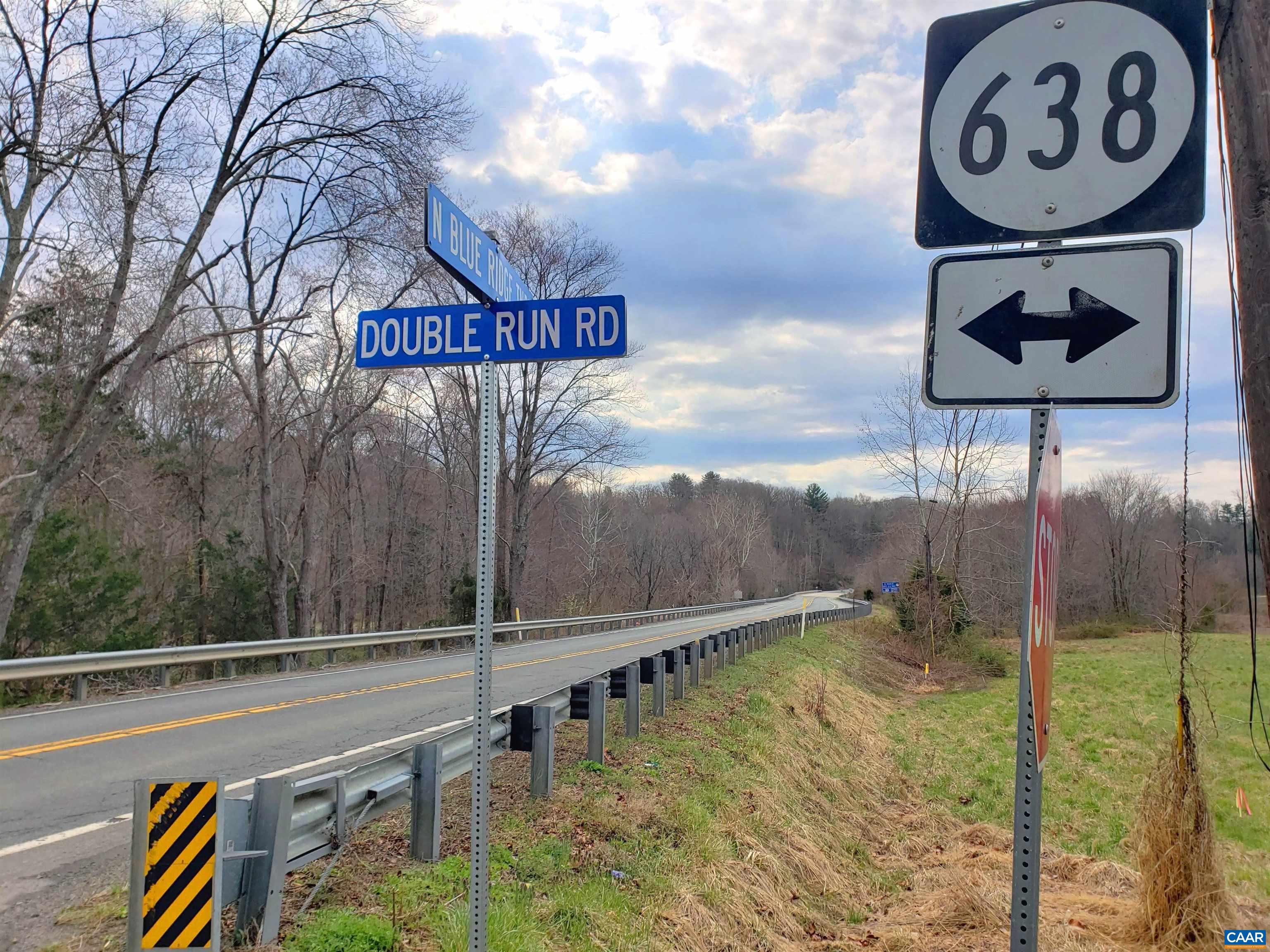 Double Run Road Madison, VA 22727 - Photo 2 of 26 a view of a street sign under a large tree