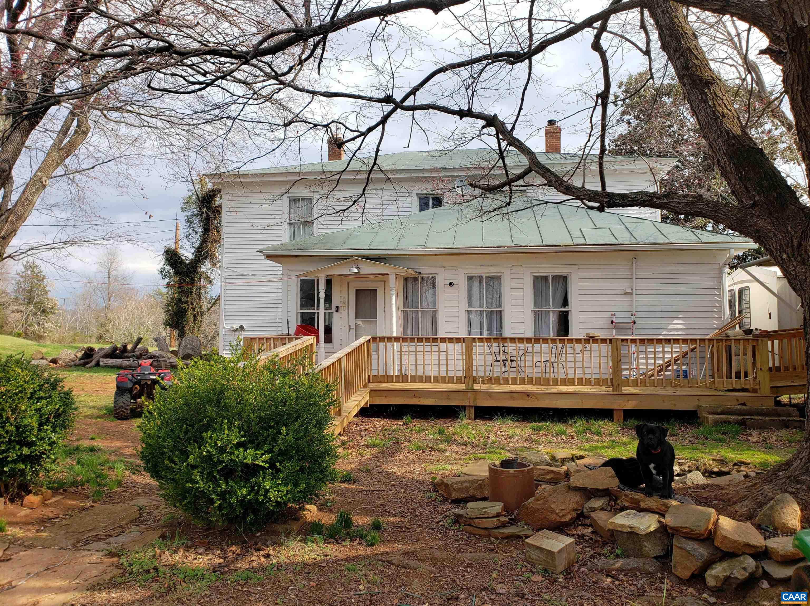 Double Run Road Madison, VA 22727 - Photo 7 of 26 a view of a house with a large tree and a yard