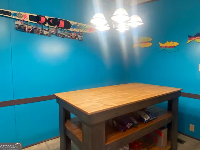 a room with closet and wooden floor