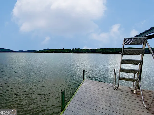 a view of outside space with a lake view