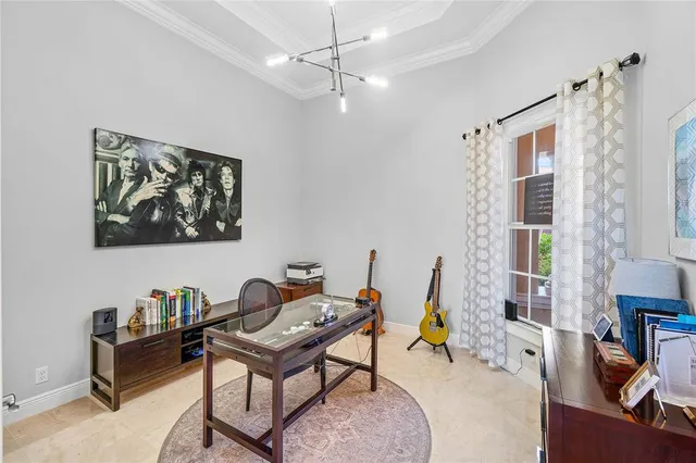 a living room with furniture a rug and a window