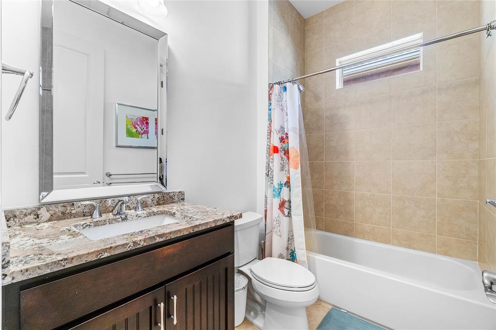 6375 Bellamalfi Street Boca Raton, FL 33496 - Photo 16 of 25 a bathroom with a sink a toilet and a bathtub