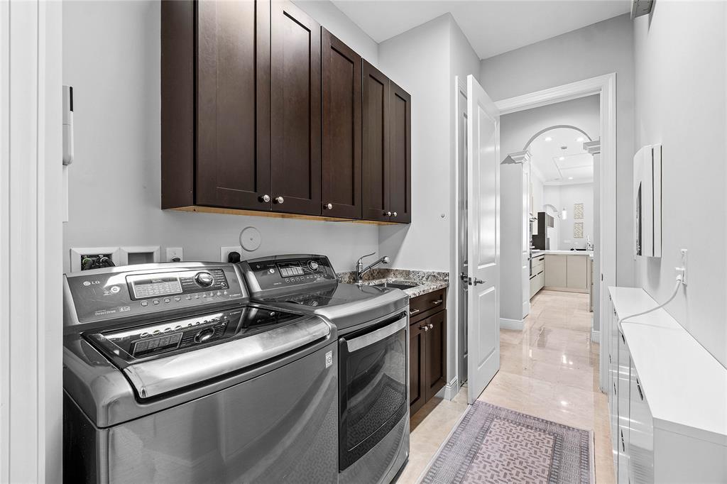 6375 Bellamalfi Street Boca Raton, FL 33496 - Photo 21 of 25 a kitchen with a stove and a cabinets