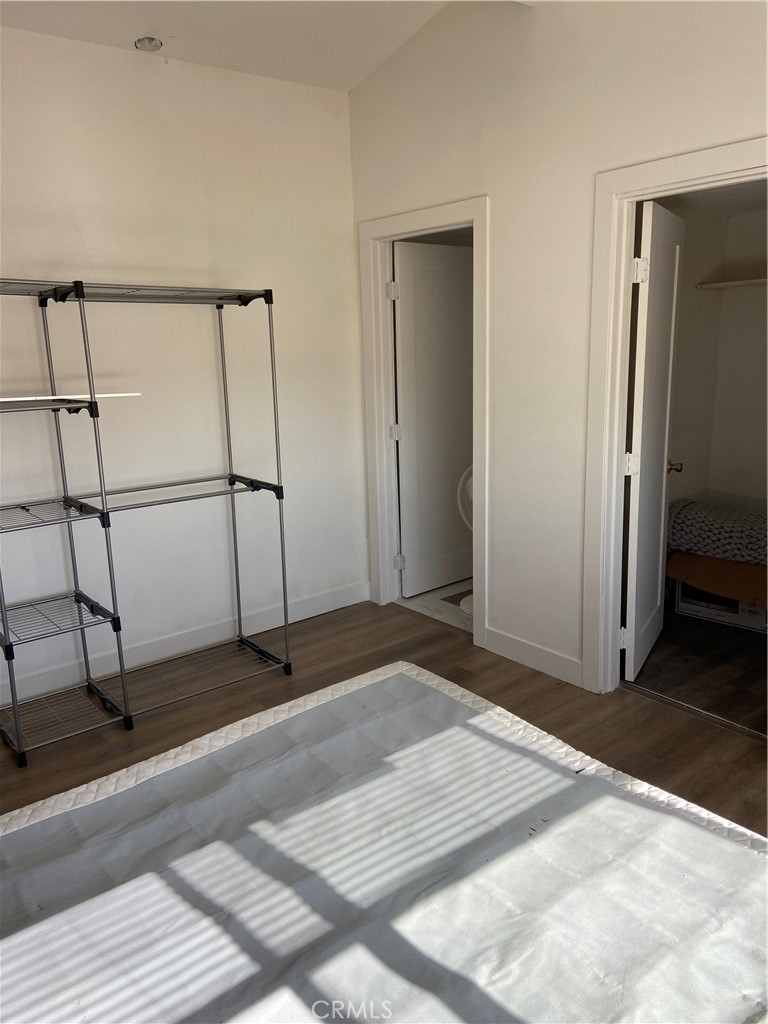 69626 Brant Cross Road Twentynine Palms, CA 92277 - Photo 25 of 33 a bedroom with a bed and a dresser