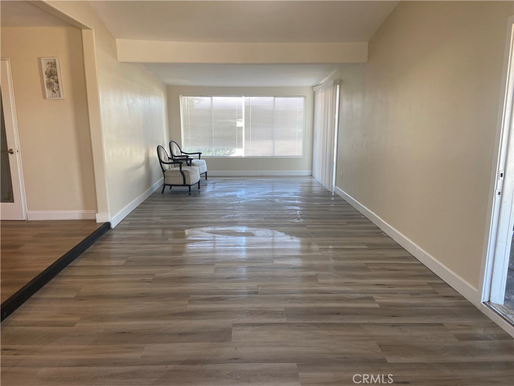 69626 Brant Cross Road Twentynine Palms, CA 92277 - Photo 29 of 33 a view of empty room with wooden floor