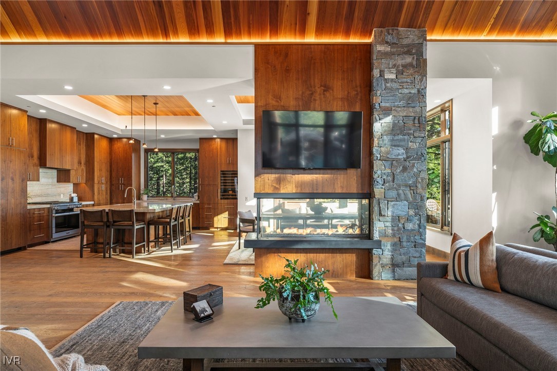823 Ellen Court Incline Village, NV 89451 - Photo 12 of 45 a living room with fireplace furniture and a large window