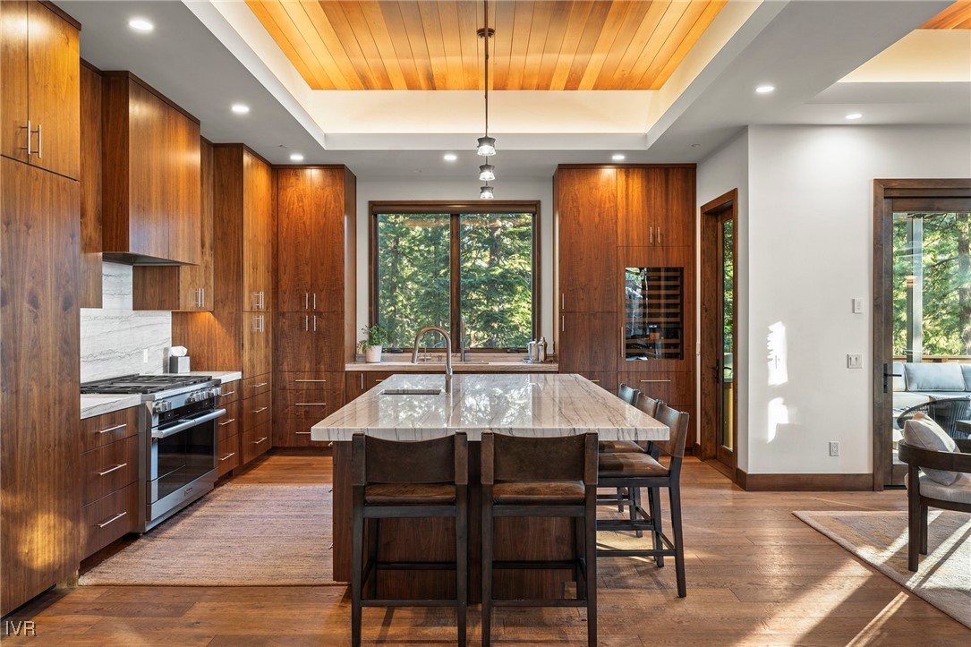 823 Ellen Court Incline Village, NV 89451 - Photo 14 of 45 a large kitchen with a table and chairs
