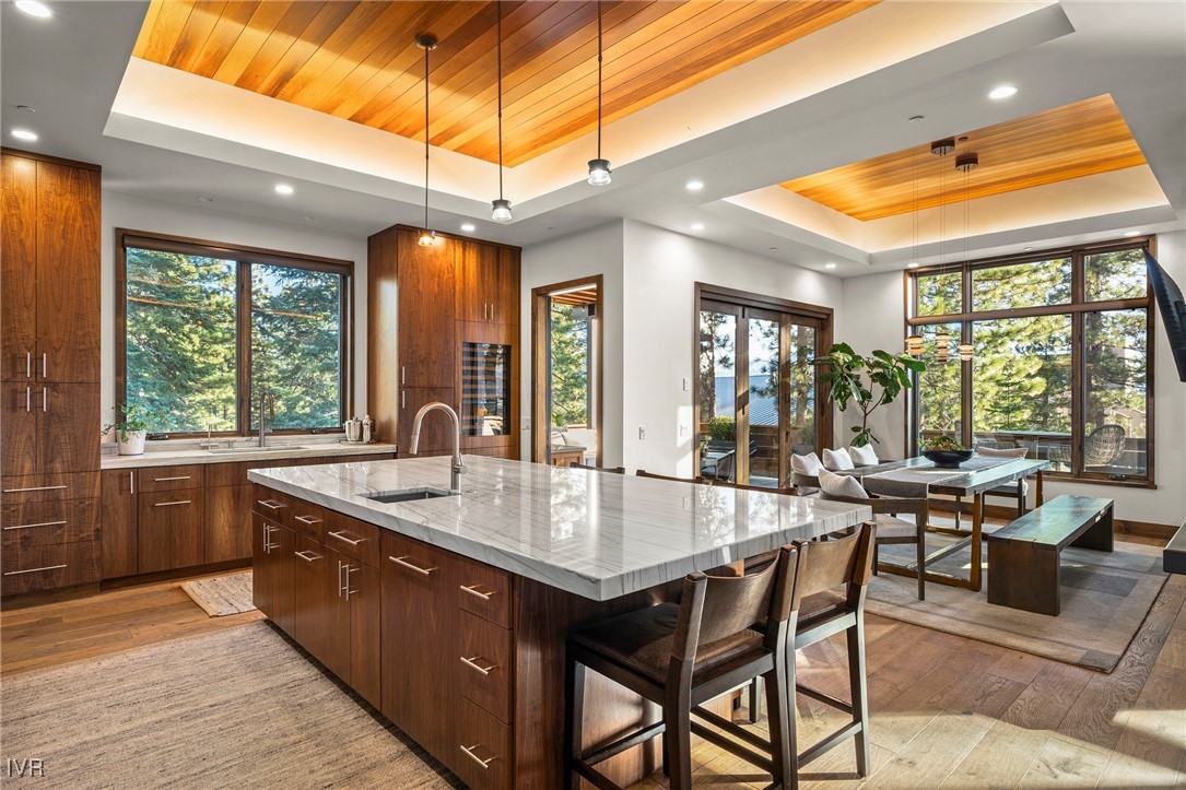 823 Ellen Court Incline Village, NV 89451 - Photo 20 of 45 a dining hall with stainless steel appliances granite countertop a sink and dishwasher a oven with granite countertops