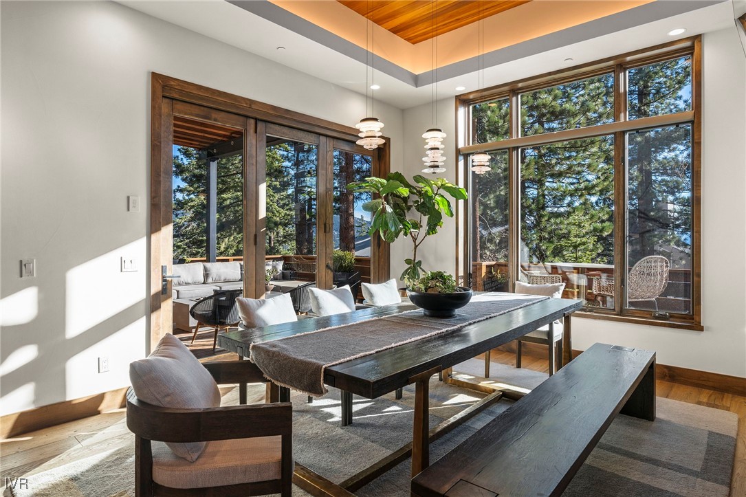 823 Ellen Court Incline Village, NV 89451 - Photo 21 of 45 a view of a dining room with furniture window and wooden floor