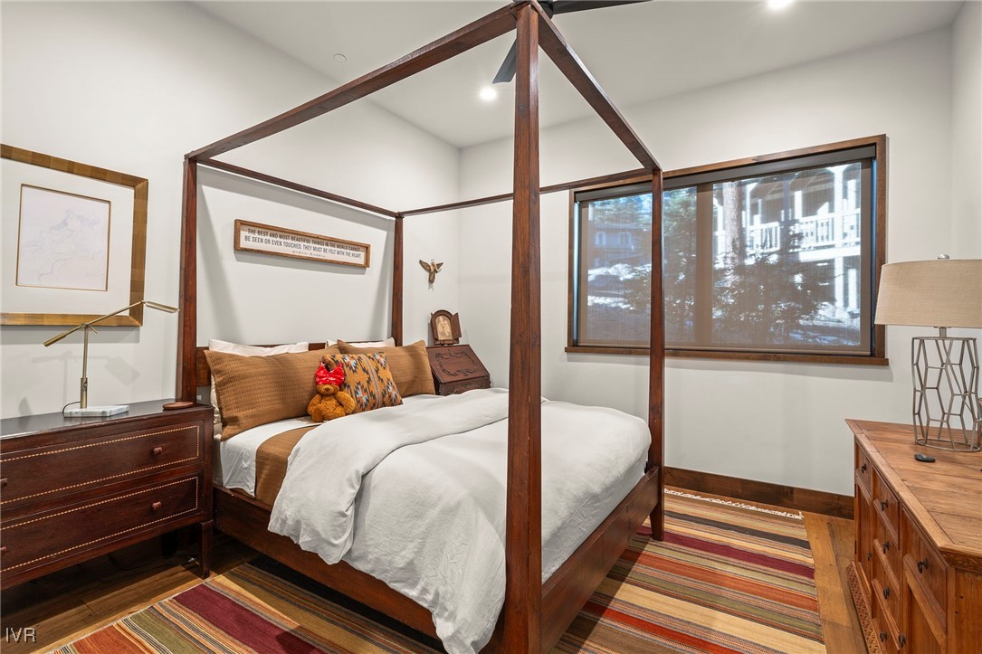823 Ellen Court Incline Village, NV 89451 - Photo 35 of 45 a bedroom with a bed and wooden floor