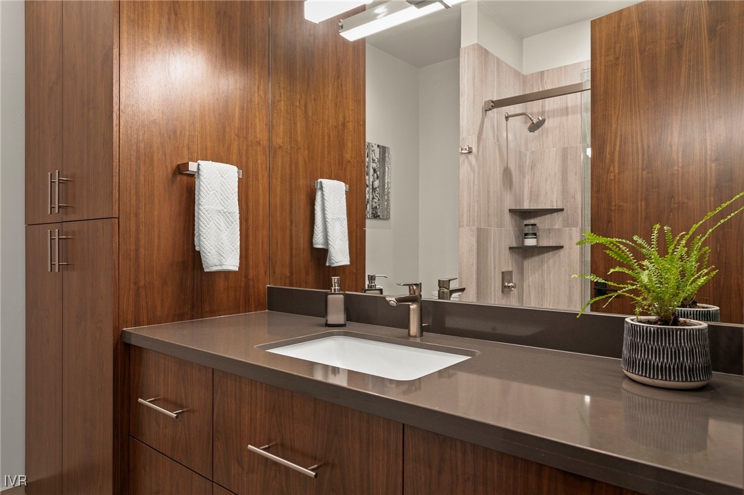 823 Ellen Court Incline Village, NV 89451 - Photo 37 of 45 a bathroom with a double vanity sink and a mirror