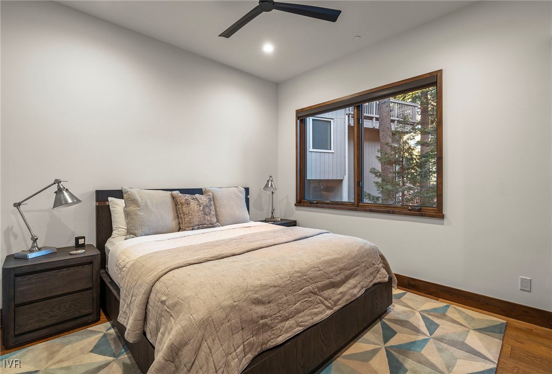 823 Ellen Court Incline Village, NV 89451 - Photo 38 of 45 a bedroom with a large bed and a window