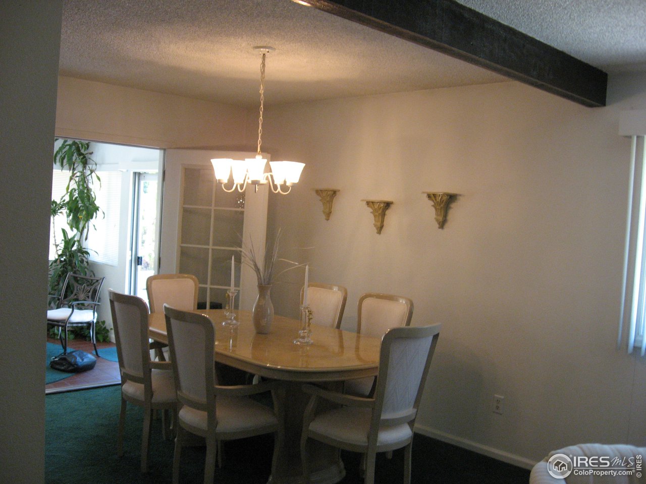 2512 Hawthorne Road Fort Collins, CO 80524 - Photo 14 of 31 Dining with sun room connected