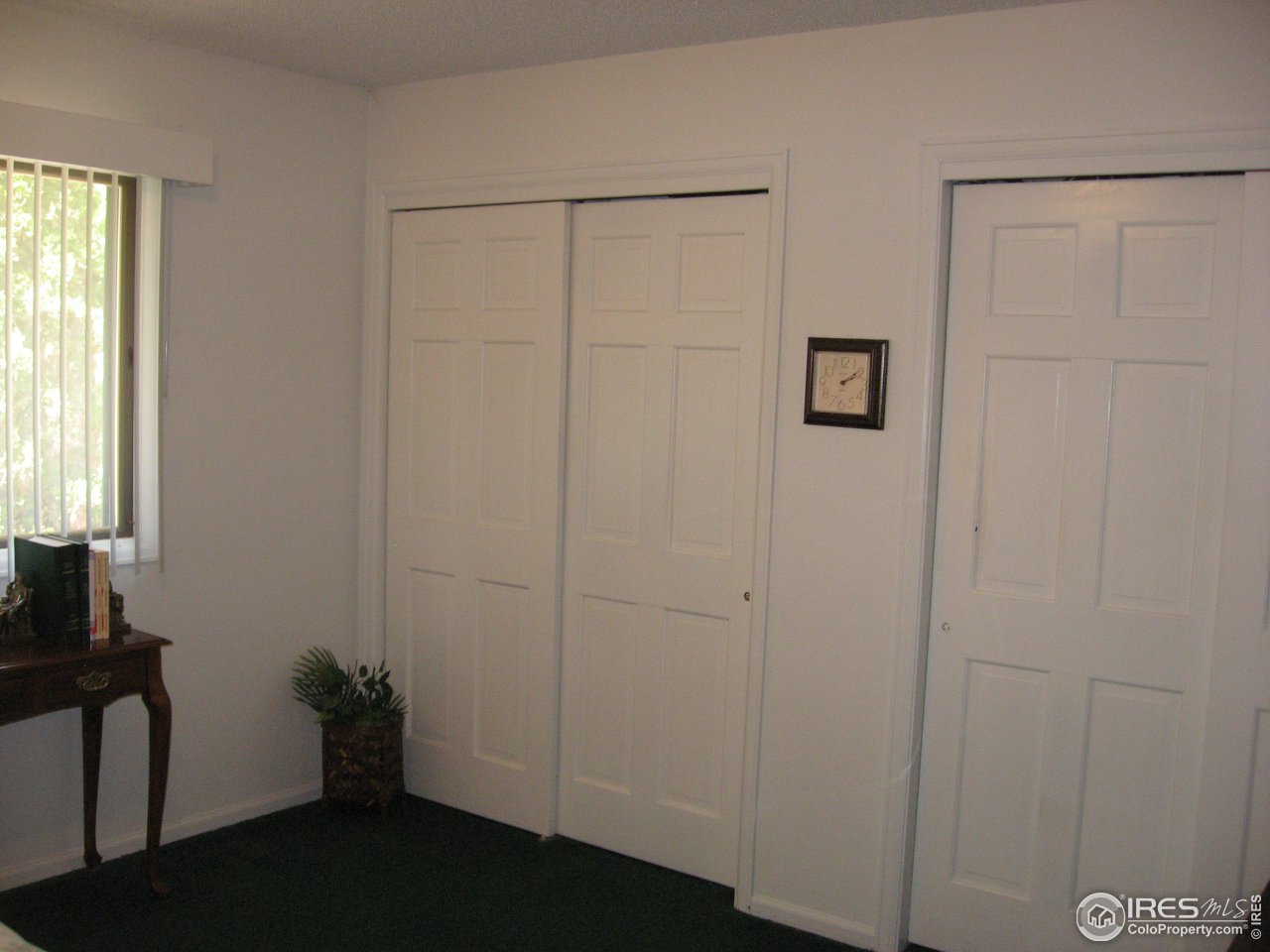 2512 Hawthorne Road Fort Collins, CO 80524 - Photo 18 of 31 Double closets in primary bedroom
