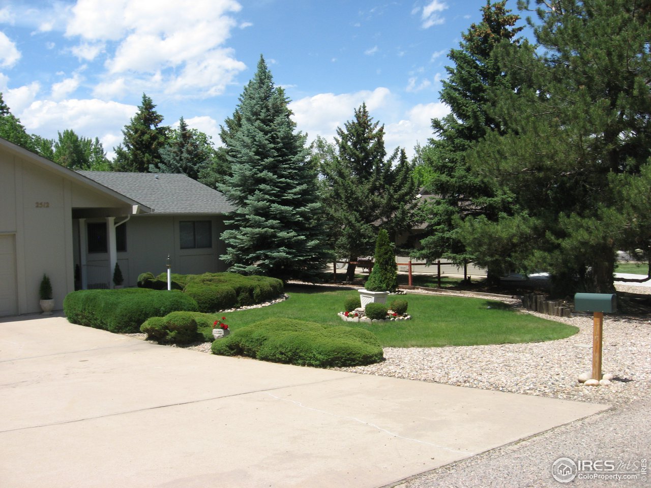 2512 Hawthorne Road Fort Collins, CO 80524 - Photo 31 of 31 Front yard and trees!