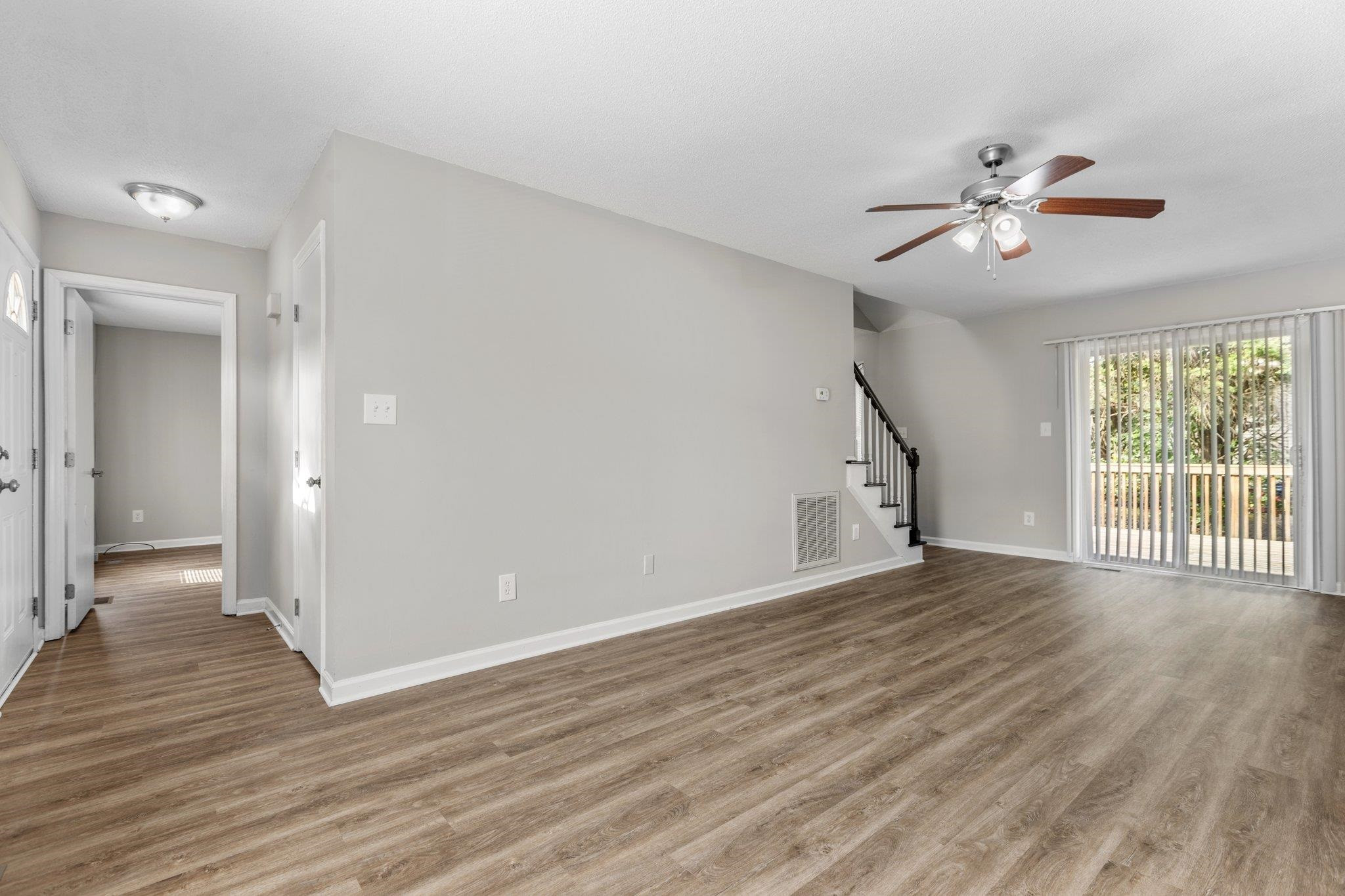 1917 Ranch Mill Circle Raleigh, NC 27610 - Photo 9 of 30 Vinyl plank throughout first floor!