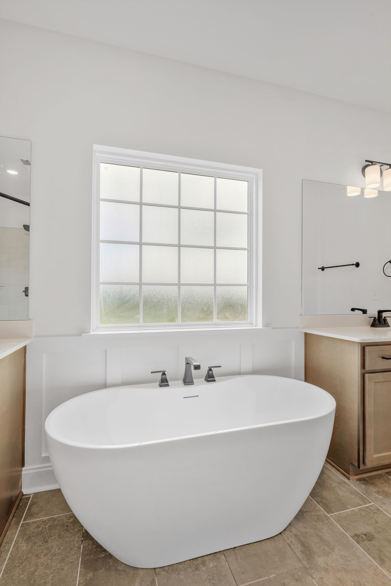 7505 Shoal Mill Point Fairview, TN 37062 - Photo 16 of 55 a white bath tub sitting in a bathroom