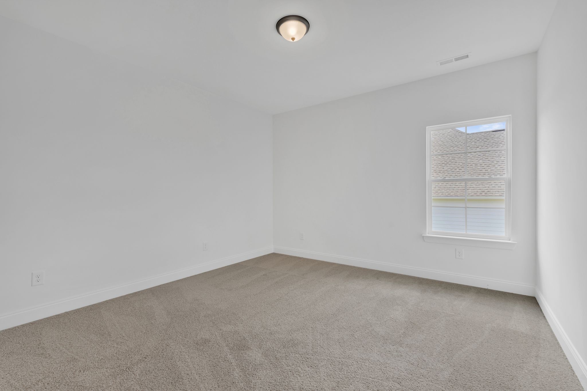 7505 Shoal Mill Point Fairview, TN 37062 - Photo 29 of 55 an empty room with windows