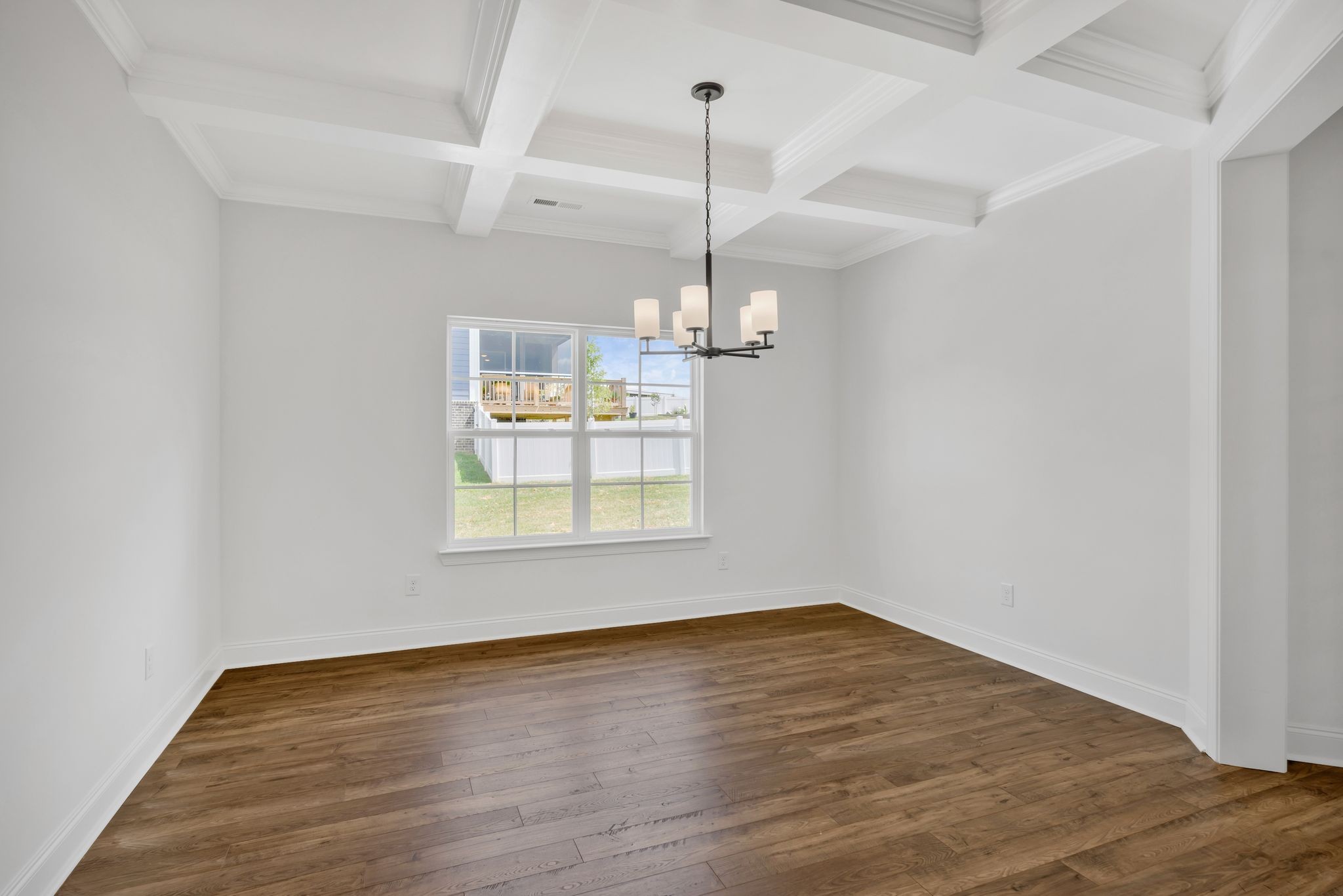 7505 Shoal Mill Point Fairview, TN 37062 - Photo 36 of 55 a view of an empty room with wooden floor and fan