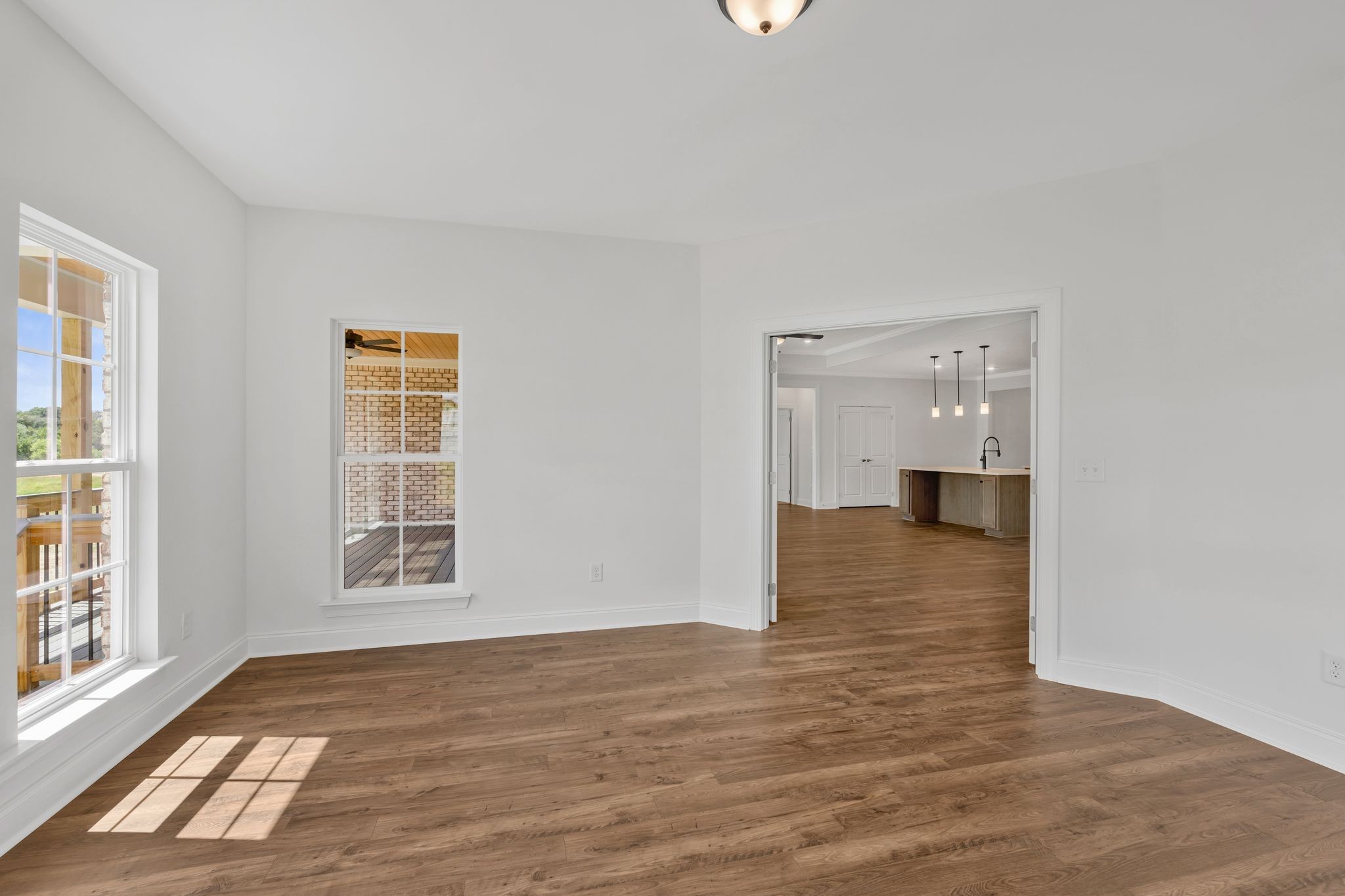 7505 Shoal Mill Point Fairview, TN 37062 - Photo 39 of 55 an empty room with wooden floor and windows