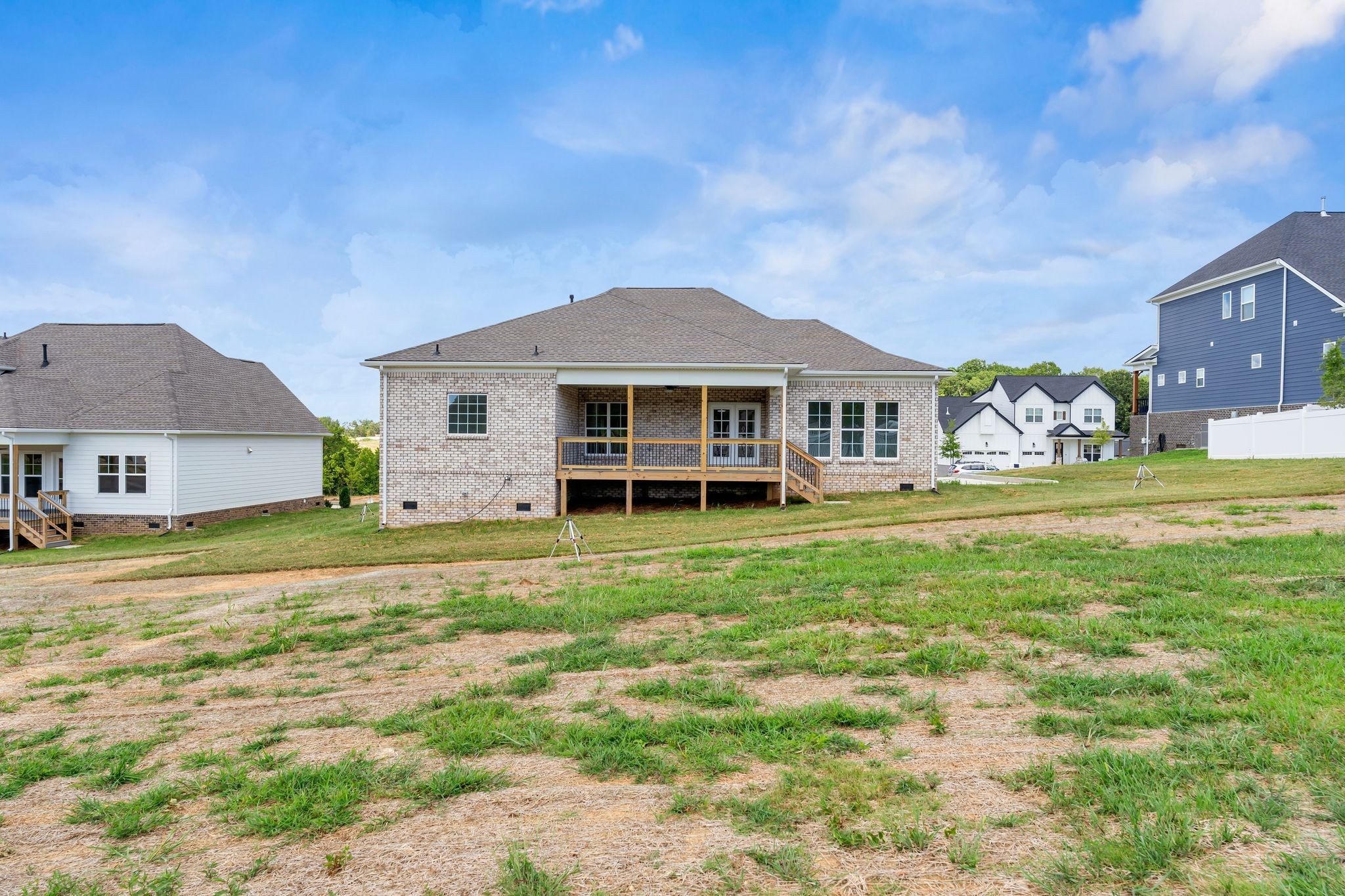 7505 Shoal Mill Point Fairview, TN 37062 - Photo 52 of 55 a front view of a house with a garden