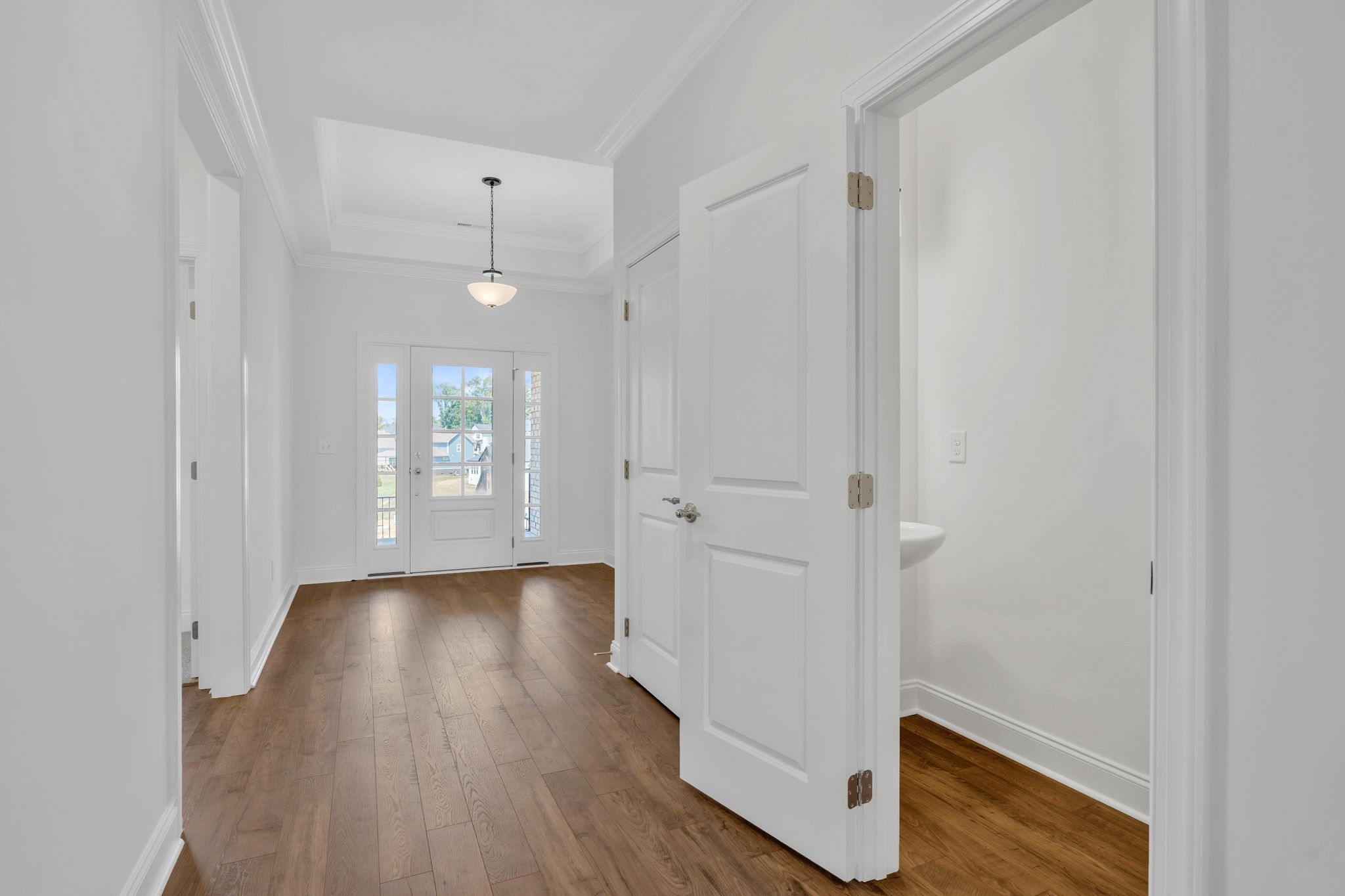 7505 Shoal Mill Point Fairview, TN 37062 - Photo 6 of 55 wooden floor in an empty room with a window