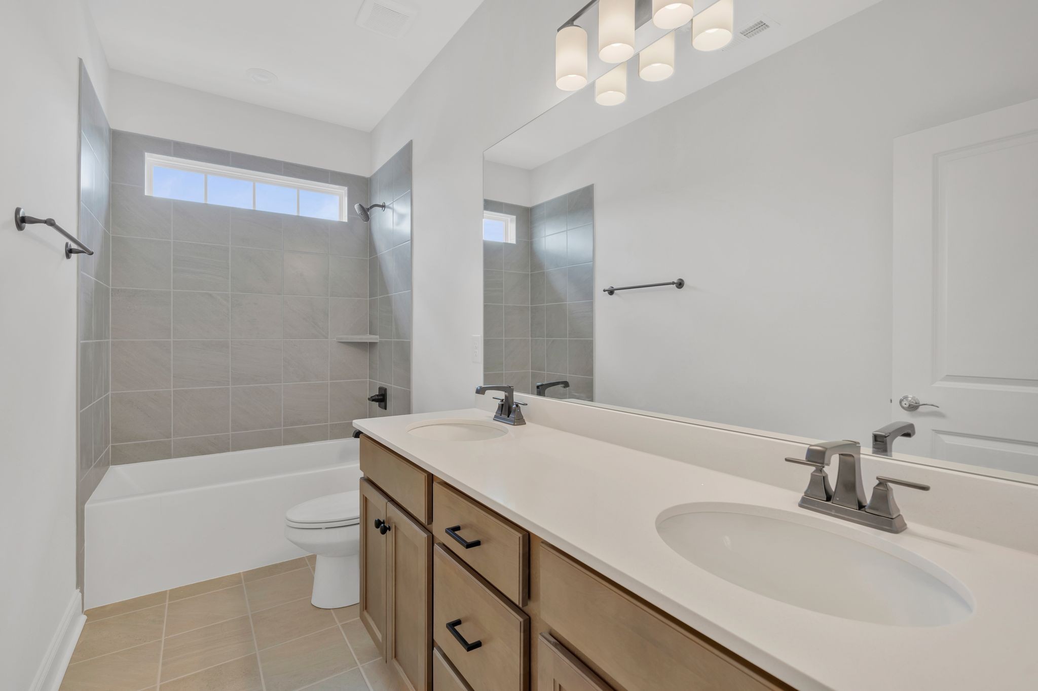 7505 Shoal Mill Point Fairview, TN 37062 - Photo 7 of 55 a bathroom with a sink a toilet and shower