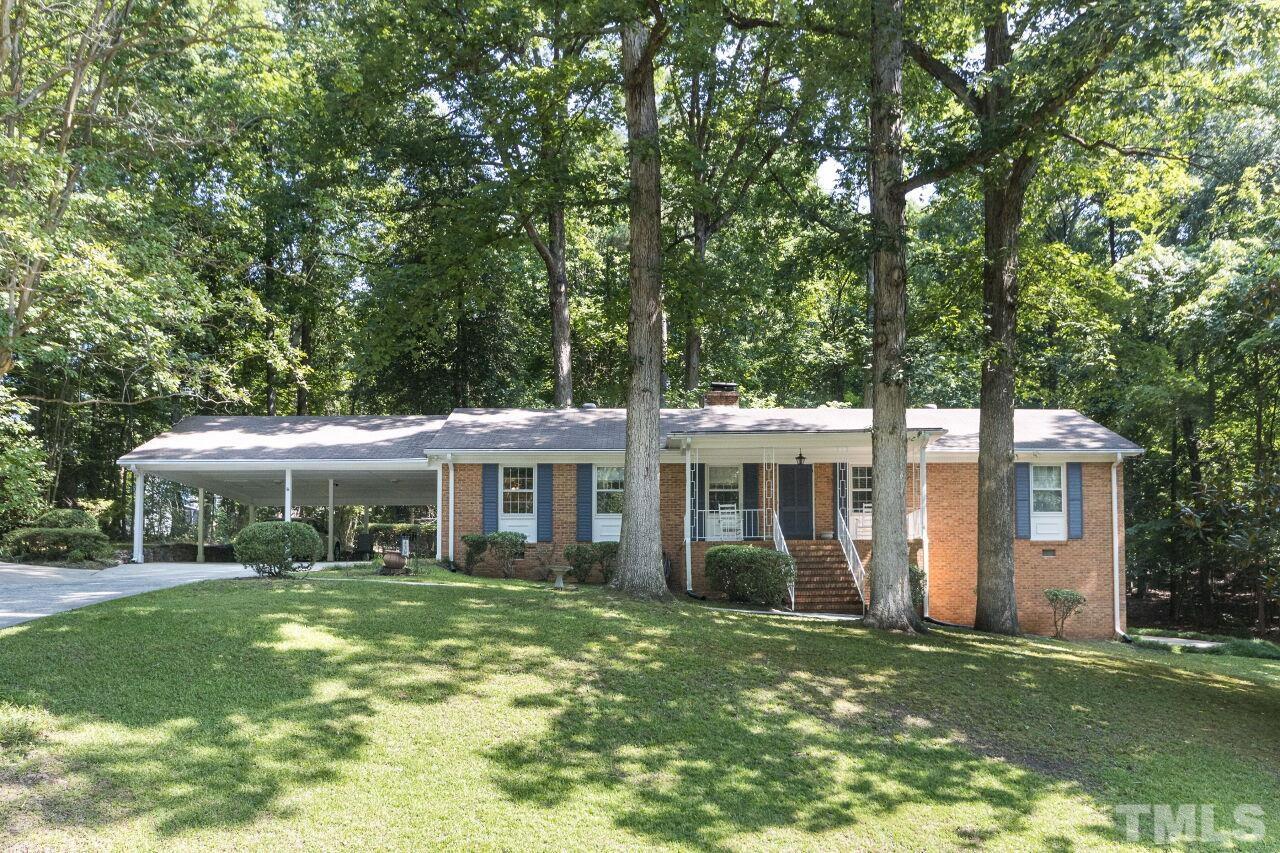 4215 Jane Lane Raleigh, NC 27604 - Photo 1 of 32 a view of a yard in front of house