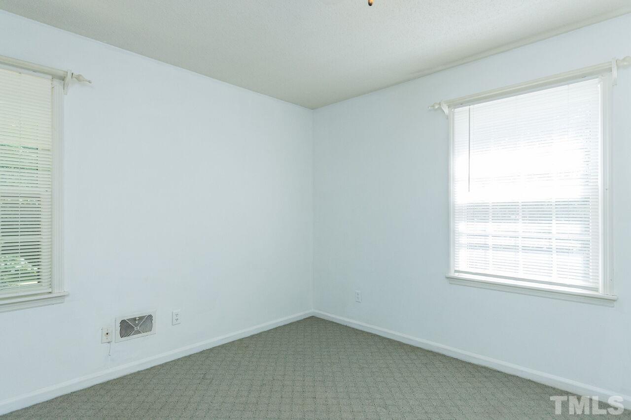 4215 Jane Lane Raleigh, NC 27604 - Photo 19 of 32 an empty room with a window