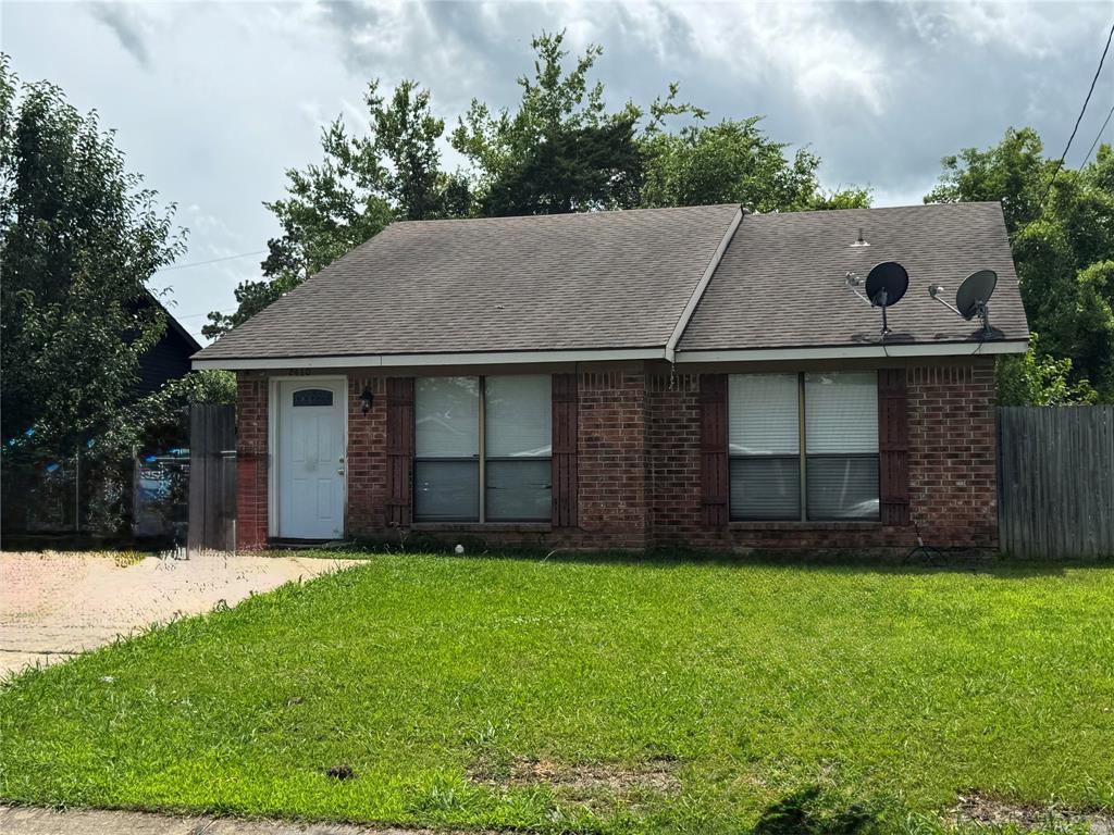 4515 Southeast Loop 286 Paris, TX 75460 - Photo 28 of 37 a view of a house with a yard and pathway